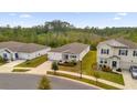 One-story house, aerial view showing location in a residential area at 9331 Revere Ave, Leesburg, FL 34788