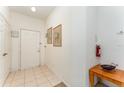 Bright and spacious entryway with tiled floors and simple decor at 2303 Butterfly Palm Way # 201, Kissimmee, FL 34747