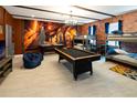 Game room with pool table, bunk beds, and mural at 4209 Paragraph Dr, Kissimmee, FL 34746