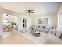 Bright living room with a neutral color palette and stylish furniture at 6150 Medford Dr, Orlando, FL 32808