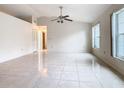 Spacious living room featuring tile floors and ample natural light at 936 Gillingham Ct, Kissimmee, FL 34758
