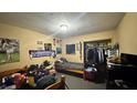 Small condo bedroom with twin bed and closet at 197 Scottsdale Sq # 197, Winter Park, FL 32792