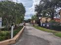 Gated entrance to the Oak Shadow Condominium community at 2868 N Powers Dr # 5, Orlando, FL 32818