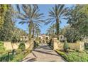 Stunning home with gated entry and manicured landscaping at 1120 Preserve Point Dr, Winter Park, FL 32789