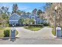 Stunning two-story home boasts curb appeal with landscaping at 2229 Earleaf Ct, Longwood, FL 32779