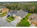 Housetop view showing a single Gathering house, driveway and neighborhood at 3621 Daydream Pl, Saint Cloud, FL 34772