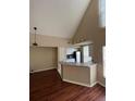 Kitchen features a breakfast bar and hardwood floors at 6348 Raleigh St # 1311, Orlando, FL 32835
