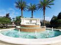 The Fountains community entrance with a water feature and signage at 8145 Roseville Blvd, Davenport, FL 33896