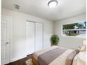 Charming bedroom with double door closet and hardwood floors at 1810 Selleen Dr, Eustis, FL 32726