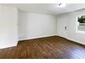 Spacious dining area with hardwood flooring, ready for your table at 1810 Selleen Dr, Eustis, FL 32726