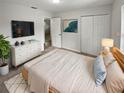 Main bedroom with ample closet space and neutral decor at 4030 Luray Dr, Orlando, FL 32812