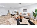Bright living room features a neutral color palette and modern furnishings at 4403 Brooke St, Orlando, FL 32811