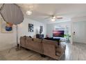 Living room with sectional sofa and view to exterior at 5437 Lake Margaret Dr # C, Orlando, FL 32812