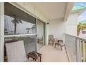 Private balcony with patio furniture, offering ocean views at 815 Ocean Shore Blvd # U9A, Ormond Beach, FL 32176
