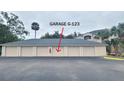Private garage with ample space for parking and storage at 940 Village Trl # 8-101, Port Orange, FL 32127