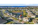 Community view showcasing home's location and lake at 16719 Sanctuary Dr, Winter Garden, FL 34787