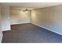 Spacious living room with carpeted floors at 1695 Lee Rd # B211, Winter Park, FL 32789