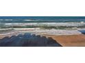 Shadowy beach and ocean view from high above at 5203 S Atlantic Ave # 815B, New Smyrna Beach, FL 32169