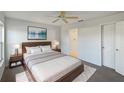 Cozy bedroom with a wooden bed frame and en-suite bathroom at 7207 Summit Pl, Winter Haven, FL 33884