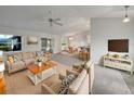 Bright living room features ample natural light and an open floor plan at 7207 Summit Pl, Winter Haven, FL 33884