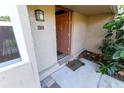 View of the front door and entryway at 1009 Grove St # 90, Maitland, FL 32751