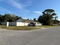 House exterior showcasing a corner lot and driveway at 1350 E Harrison St, Oviedo, FL 32765