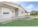 Front view of a gray house with white accents at 1108 Evangeline Ave, Orlando, FL 32809
