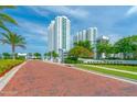 Brick road leads to the entrance of the Marina Grande building at 241 Riverside Drive # 409, Daytona Beach, FL 32117