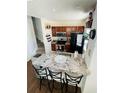 Modern kitchen with granite countertops and stainless steel appliances at 2600 Lodi Cir # 101, Kissimmee, FL 34746