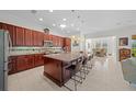 Spacious kitchen with island and stainless steel appliances at 5106 Nw 35Th Lane Rd, Ocala, FL 34482