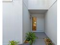Inviting front entrance with lush landscaping and a private walkway at 2660 Bent Hickory Cir, Longwood, FL 32779