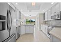 Modern kitchen featuring updated appliances and ample cabinet space at 2660 Bent Hickory Cir, Longwood, FL 32779