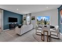 Open-plan living room with modern furnishings, stylish decor, and lots of natural light at 3330 Thicket St, Tavares, FL 32778
