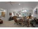 Spacious living room featuring high ceilings, large windows, and comfortable seating at 1611 Walnut Ave, Winter Park, FL 32789