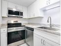 Updated kitchen, featuring stainless steel appliances and granite countertops at 200 Maitland Ave # 37, Altamonte Springs, FL 32701