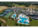 Community overview with pools, tennis courts, bocce ball, and clubhouse at 2200 Seagrass Pt # 428, Kissimmee, FL 34747