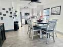 Open concept dining area with kitchen view at 631 Callahan St, Winter Park, FL 32789