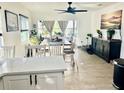 Bright dining room with farmhouse table and seating at 631 Callahan St, Winter Park, FL 32789