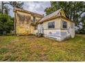 Back of house with additional building at 750 E Pearl St, Bartow, FL 33830