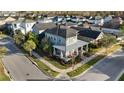 Two-story home situated on a corner lot in a neighborhood at 13871 Briand Ave, Orlando, FL 32827