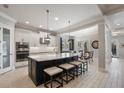 Open concept kitchen featuring a large island and breakfast area at 13871 Briand Ave, Orlando, FL 32827