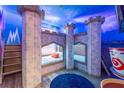 Themed bedroom with castle bunk beds and whimsical decor at 2735 Calabria N Ave, Davenport, FL 33897