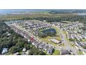 Aerial view of the house and neighborhood, showing location and community amenities at 2775 Red Horse Dr, Kissimmee, FL 34744