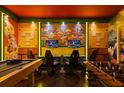 Game room with two monitors, foosball table, and Mario theme at 3083 Mahalo Dr, Davenport, FL 33897