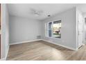 Spacious dining room with hardwood floors and large window at 328 E Hillcrest St, Altamonte Springs, FL 32701