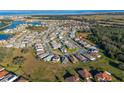 Aerial view of a house in a residential neighborhood with water access at 1861 Goblet Cove St, Kissimmee, FL 34746