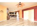 Open dining area adjacent to kitchen, with hardwood floors at 2642 Maggiore Cir, Kissimmee, FL 34746