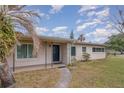 Ranch style home with covered entryway and walkway at 3107 S Park Ave, Sanford, FL 32773