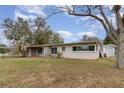 Ranch style home with a large yard and detached garage at 3107 S Park Ave, Sanford, FL 32773