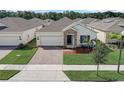 One story home in a quiet residential neighborhood at 6324 Chirpine Ln, Saint Cloud, FL 34771